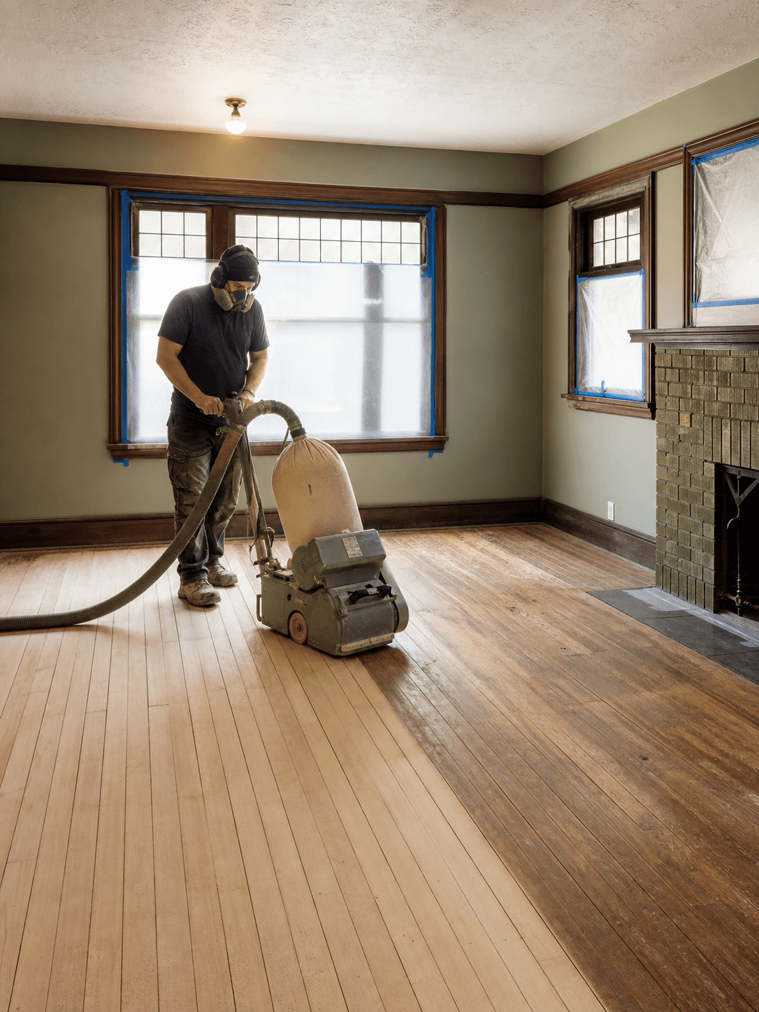 Craftsman fir floor being sanded and restored